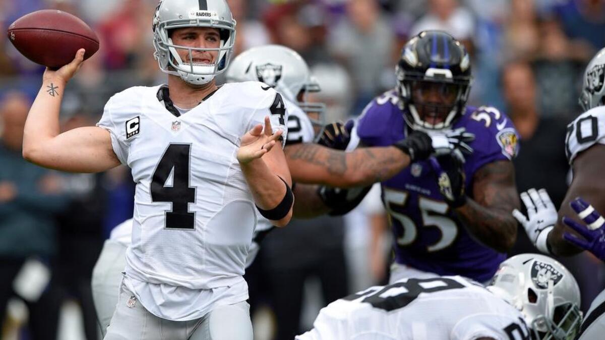 Raiders quarterback Derek Carr (4) threw a touchdown pass late in the fourth quarter gave the Oakland a 28-27 win over the host Ravens on Sunday, Oct. 2, 2016, in Baltimore.