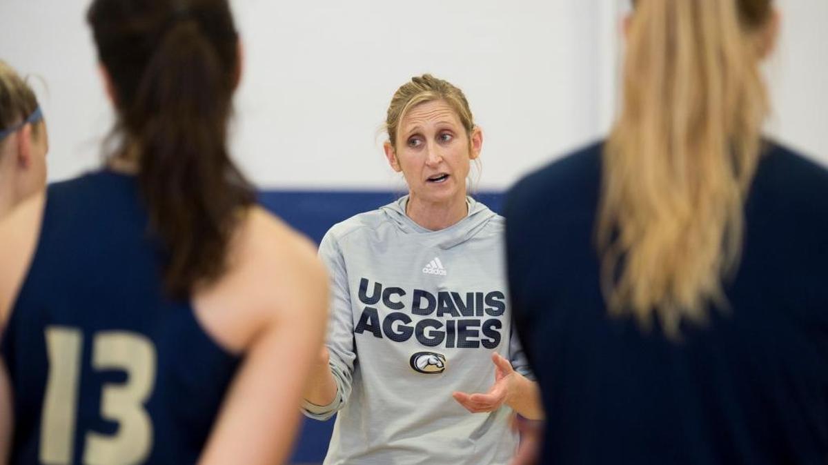 UC Davis Aggies coach Jennifer Gross speaks to players during practice ahead of the Big West Conference tournament at Hickey Gymnasium on Wednesday in Davis.