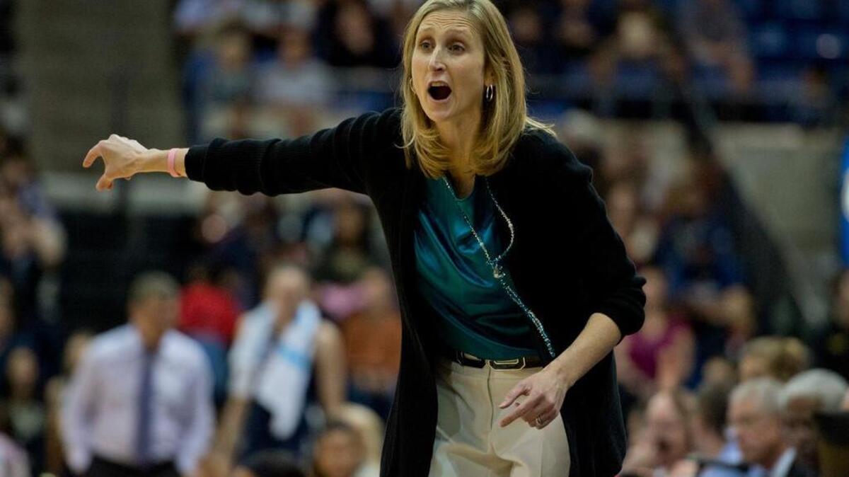 UC Davis Aggies head coach Jennifer Gross yells out direction in the second half as the Aggies fell 102-43 to defending national champion Connecticut to open the season, at The Pavilion on Friday, in Davis, on November 14, 2014.
