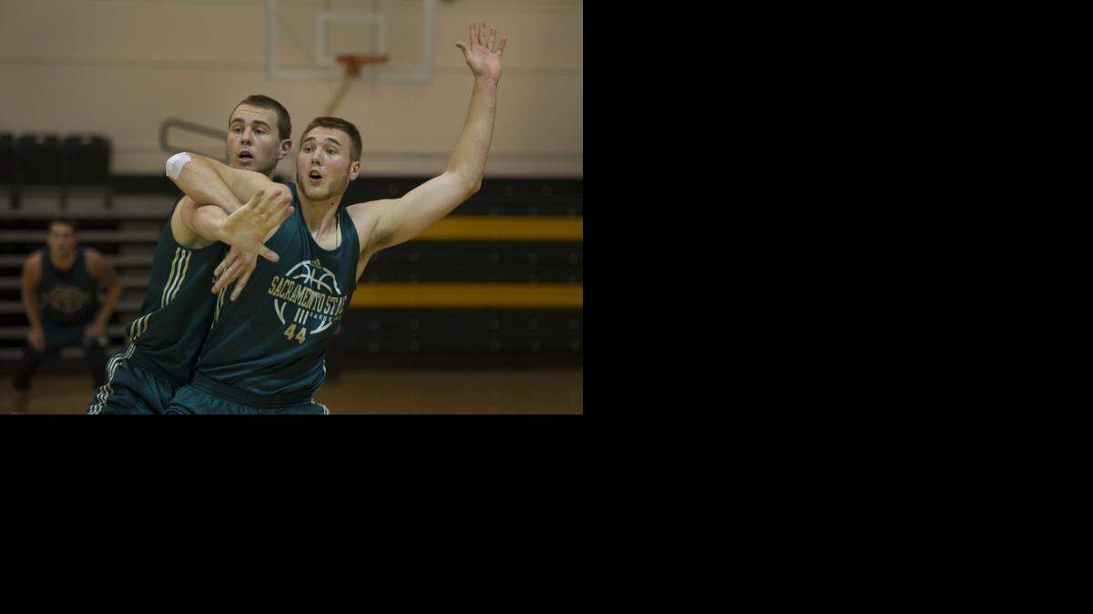 
Freshman center Eric Stuteville, front, and brother Mason Stuteville at practice on Monday, Oct. 27, 2014 at Sacramento State in Sacramento, Calif. The Hornets return all five starters from a team that went 14-16 overall, 10-10 in the Big Sky and qualified for the conference tournament for the first time since 2006. 
