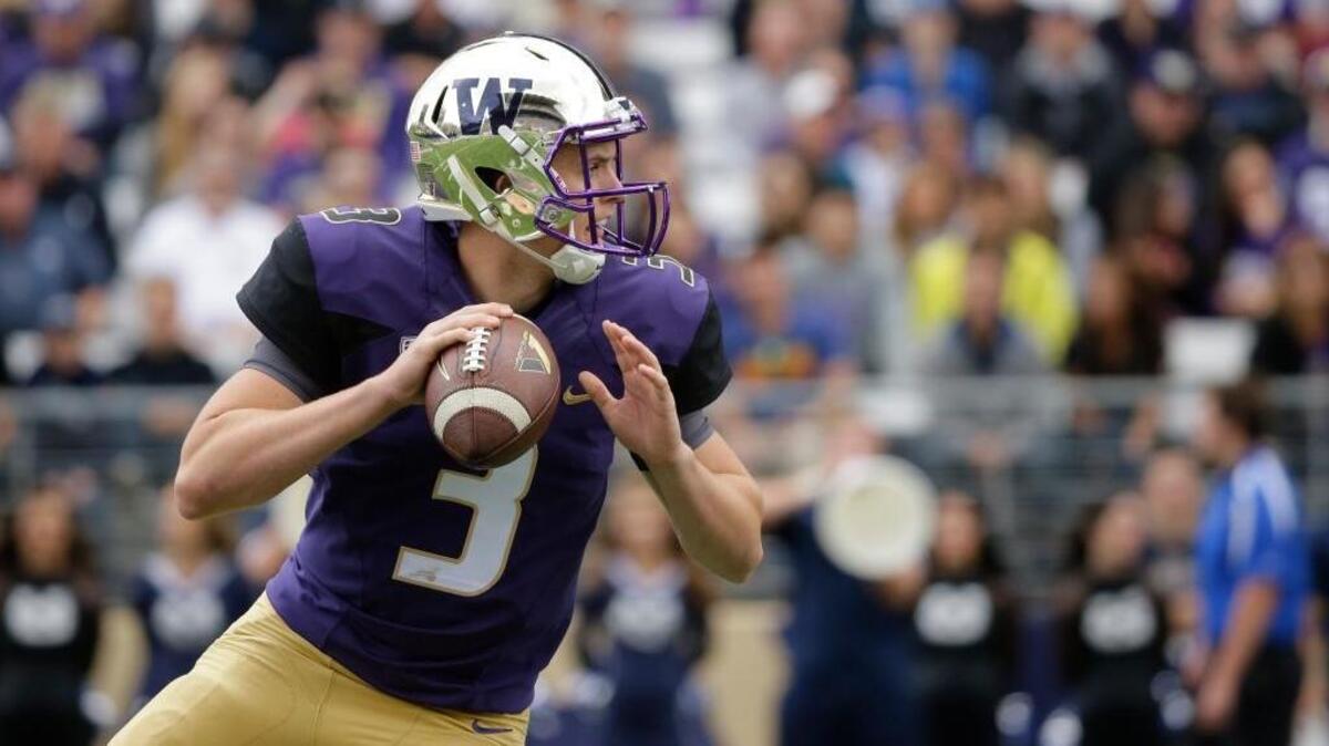 
Washington quarterback Jake Browning looks to pass against Utah State on Sept. 19, 2015, in Seattle. 

