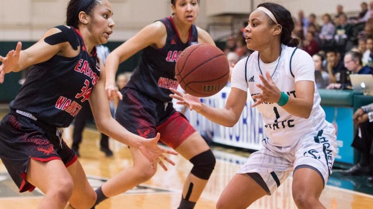 
Sacramento State senior guard Fantasia Hilliard, right, grabs the loose ball as Eastern Washington’s Jade Redmon, left, and Cece Pearl defend during a second-round NIT game Monday, March 23, 2015, in Sacramento. The Hornets went 18-16 last season, including 13-5 in Big Sky Conference play.
