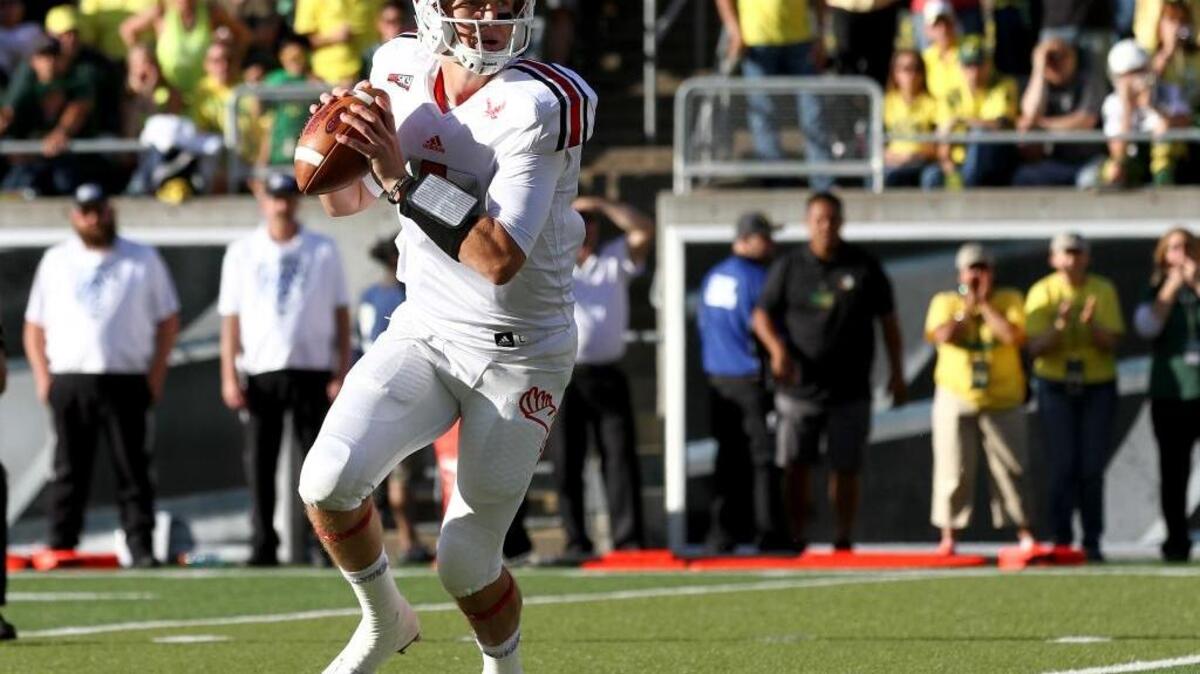 
Eastern Washington quarterback Jordan West (5) looks to throw during the second quarter against Oregon on Sept. 5 in Eugene.

