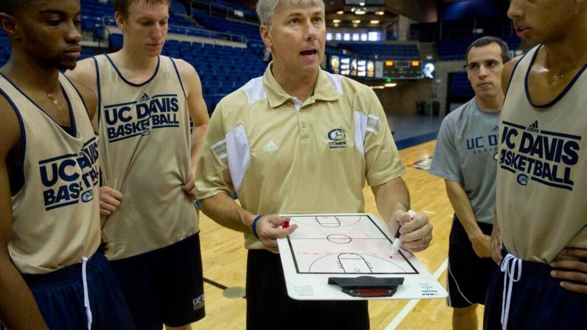 UC Davis men’s basketball coach Jim Les speaks to players during a practice last season. The former King’s team, which won the Big West Conference title in 2014-15, was selected by media members to finish tied for seventh in the nine-team league.