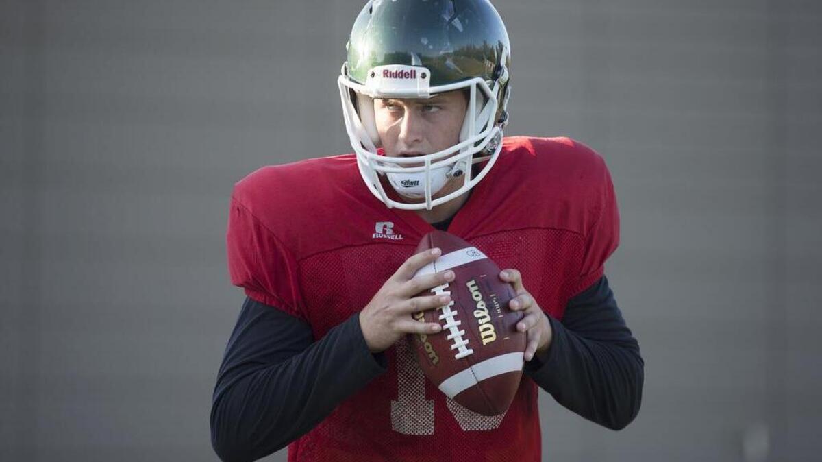 
Quarterback Daniel Kniffin goes through drills during practice at Sac State on Wednesday, August 26, 2015 in Sacramento.
