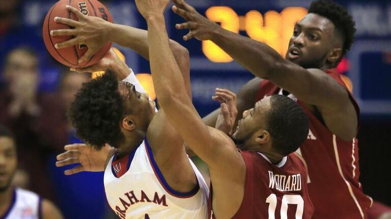 Gallery: No. 1 Kansas tops No. 2 Oklahoma in triple OT
