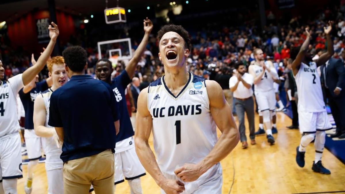UC Davis guard Lawrence White celebrates after an NCAA Tournament First Four game Wednesday in Dayton, Ohio. The Aggies beat North Carolina Central 67-63 to earn their first tournament victory.