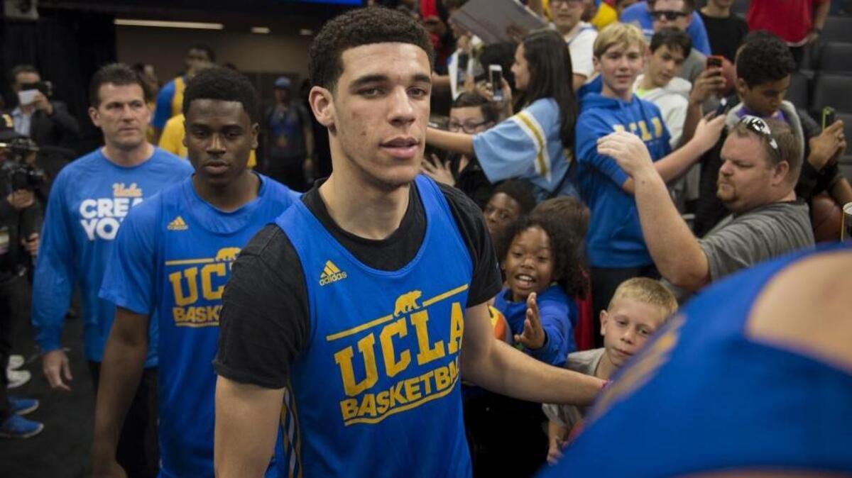 Freshman point guard Lonzo Ball and his UCLA teammates step onto the main court for the Bruins’ practice on Thursday at Golden 1 Center. Ball is expected to leave UCLA after one season and be a top pick in the NBA draft.