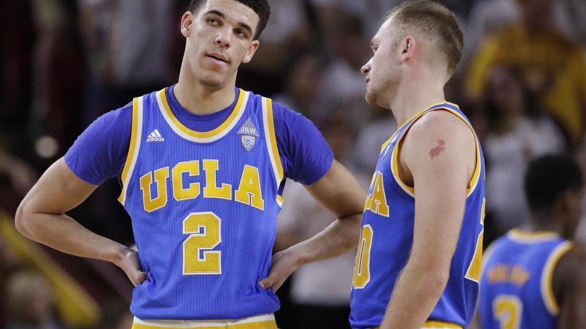 UCLA guard Lonzo Ball (2) and guard Bryce Alford talk during a free throw during the second half of an NCAA college basketball game against Arizona State, Thursday, Feb. 23, 2017, in Tempe, Ariz.