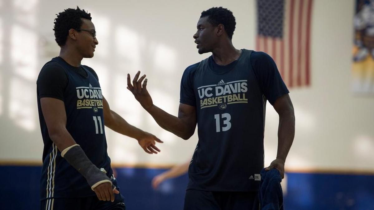 The UC Davis Aggies J.T. Adenrele, right, and teammate Chima Moneke talk over defensive assignments at practice on Tuesday evening in Hickey Gym, in Davis on Aug 9, 2016. The Aggies are practicing as they prepare for a seven-day trip through Costa Rica Aug. 20-27. It will be the third international trip for the men’s basketball program. Since the NCAA allows teams to take a foreign trip once every four years,