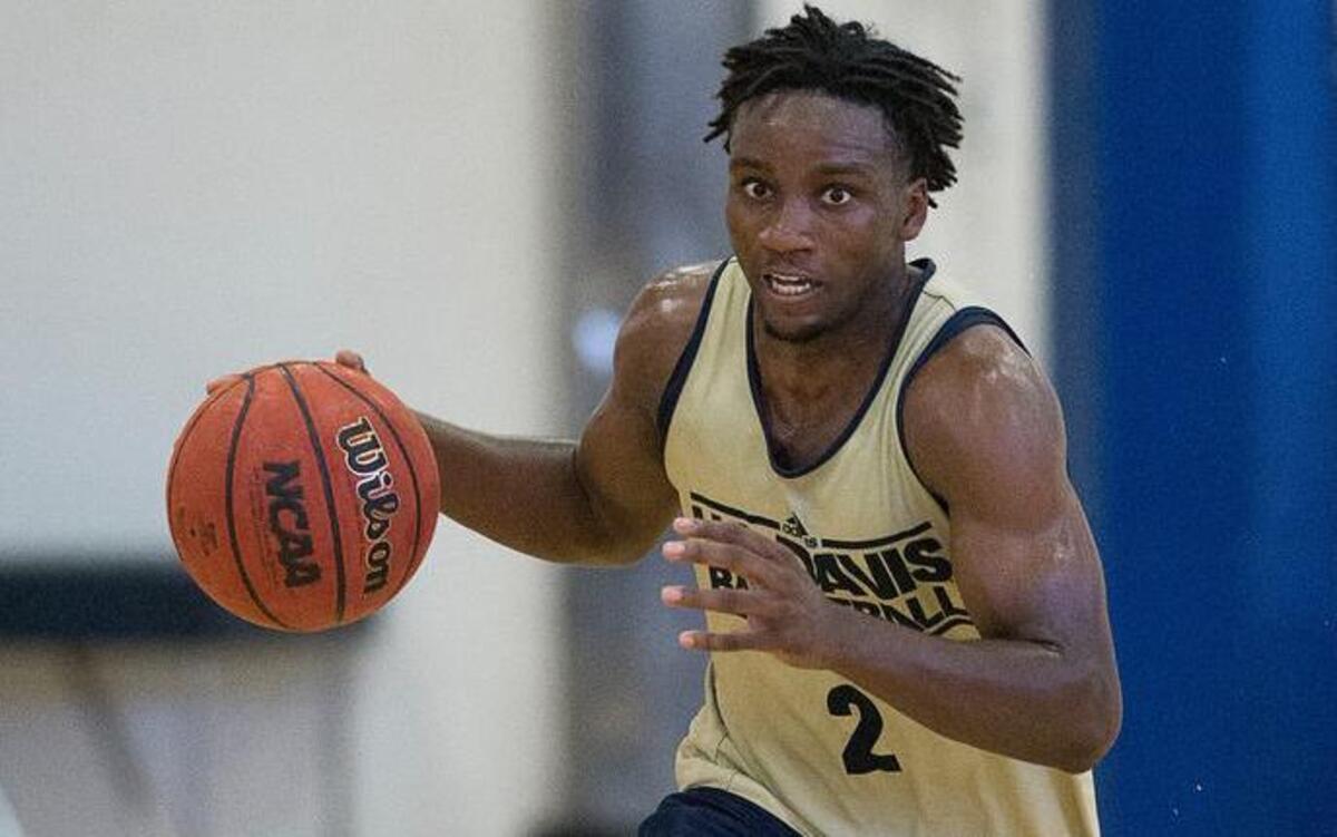 Darius Graham drives down court during practice at UC Davis last week.