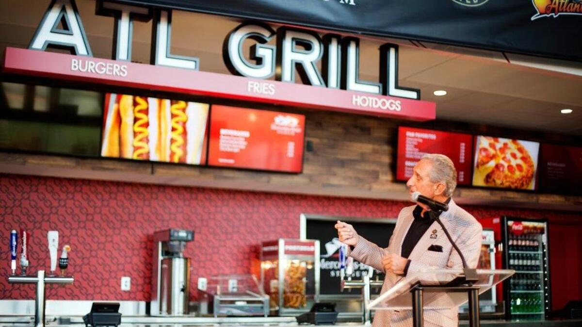 Atlanta Falcons owner Arthur Blank speaks during a news conference inside the team’s new stadium currently under construction Monday, May 16, 2016, in Atlanta. The Falcons also unveiled their new food and beverage plan which includes $2 hot dogs and soft drinks, a sharp decrease from current prices at the Georgia Dome.
