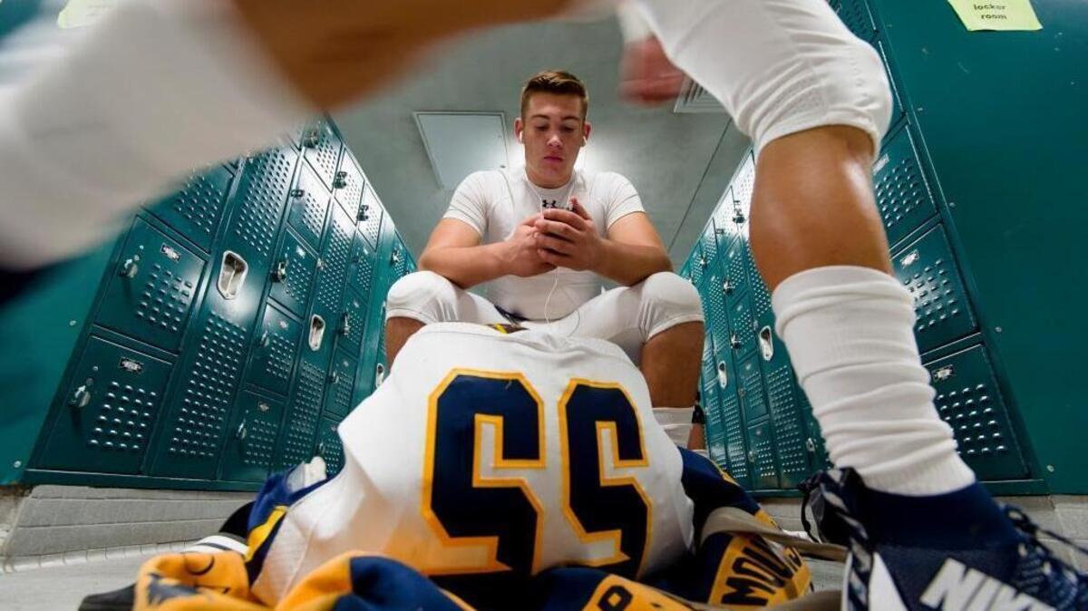 
Parker Blomquist and his Oak Ridge teammates get ready for their game against host Granite Bay on Friday, October 9, 2015. 
