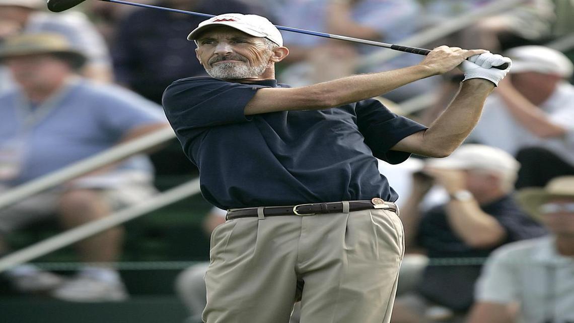 
Jim Knoll watches his drive on the first hole during the opening round of the 2006 U.S. Senior Open Championship golf tournament at Prairie Dunes Country Club in Hutchinson, Kan., July 6, 2006. (AP Photo/Charlie Riedel)
