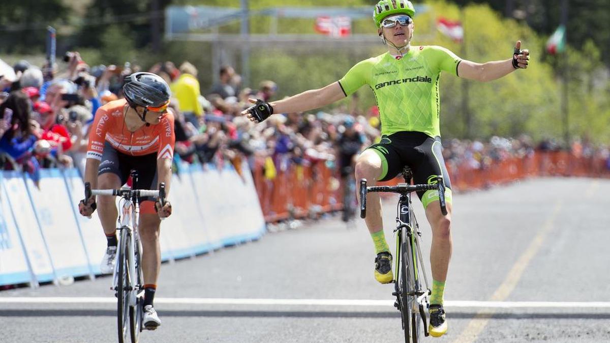 Stage winner Toms Skujins, of the Cannondale racing team, right, crosses the finish line just ahead of second place finisher Adam De Vos of Rally Cycling on Thursday, May 19, 2016 in South Lake Tahoe, Calif. The 132-mile stage started in Lodi and finished at Heavenly ski resort in South Lake Tahoe.