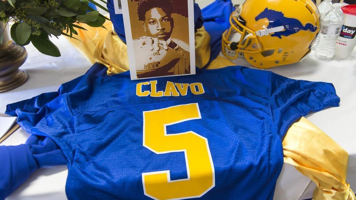 A memorial for Jaulon Clavo stands in the locker room before the game as the Grant Pacers host the Beyer High School Patriots in the Sac-Joaquin Section/Les Schwab Tires Division II first round playoff game, Monday Nov 16, 2015.
