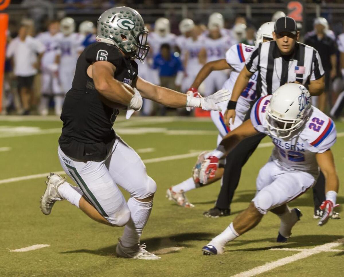 Granite Bay’s Evan Tattersall runs against Folsom on Sept. 29.
