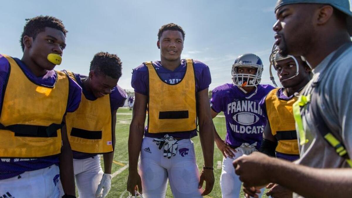 
Franklin High School defensive back Lamar Jackson huddles with the defensive back squad during practice at Hal Bartholomew Park on Tuesday, Sept. 1, 2015, in Elk Grove, Calif. Franklin plays Bellarmine-San Jose at 7 p.m. Friday at San Jose City College.
