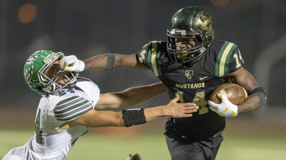 Coach TJ Ewing knew Jehiel Budgett (14) and Monterey Trail would be good this season. The undefeated Mustangs take the ultimate test against No. 1 Folsom in the Sac-Joaquin Section Division I championship game Saturday, Dec. 1, at Sacramento State. Says Ewing, “We’ll find out who we are.”