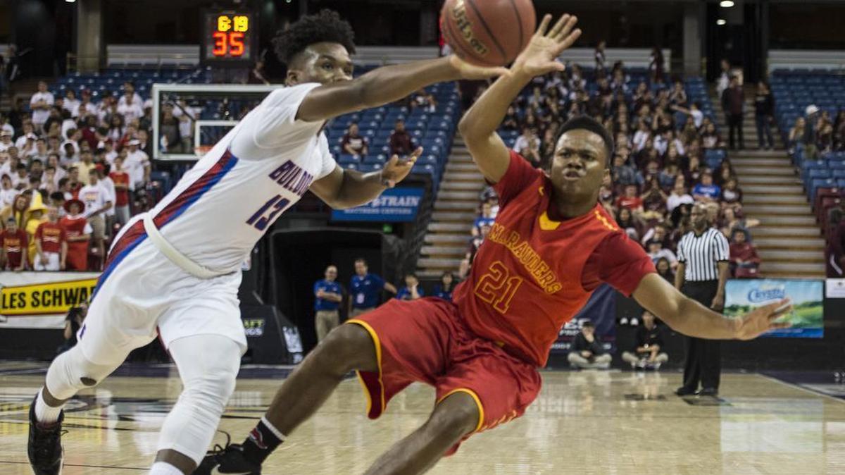 Folsom’s Martis Johnson blocks a pass intended for Jesuit’s Armoni Rivers (21) during the fourth quarter of Wednesday’s Sac-Joaquin Section Division I semifinal game at Sleep Train Arena in Sacramento.