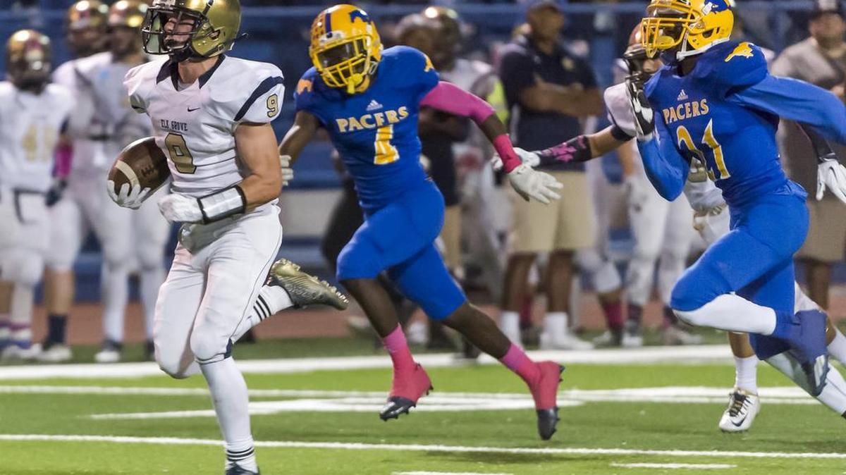 
Elk Grove Thundering Herd's Ryan Robards (9), runs for a touchdown making the score 35-7 after the point after attempt was good during the second quarter as the Grant Pacers host the Elk Grove Thundering Herd, Friday October 2, 2015. 
