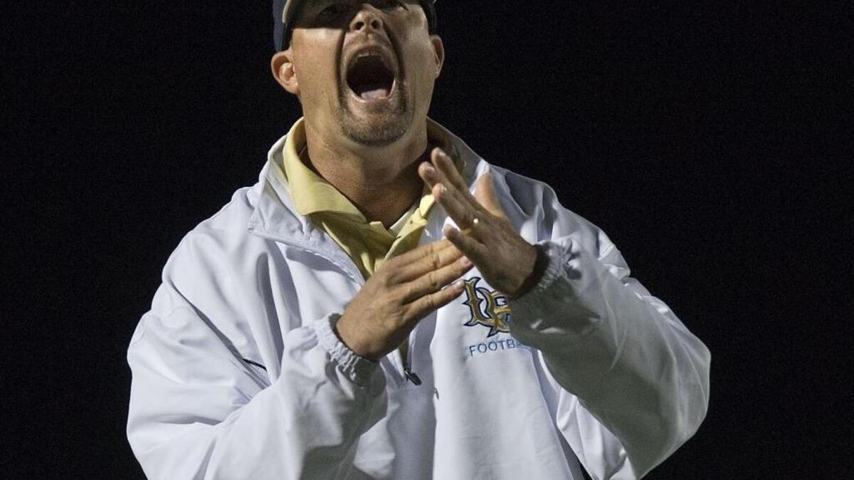 John Heffernan, calling for a timeout while coaching at Burbank High, takes over a traditionally successful Elk Grove High football program.