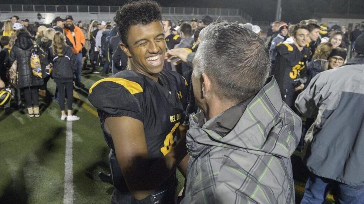 Golden Eagles Stone Smartt (4) is congratulated following the NorCal Regional Division I-A game between the Del Oro Golden Eagles and the Bakersfield Drillers at Del Oro in Loomis on Dec. 10. Smartt was named by Character Combine as the region’s Student/Athlete of the Year on Saturday.