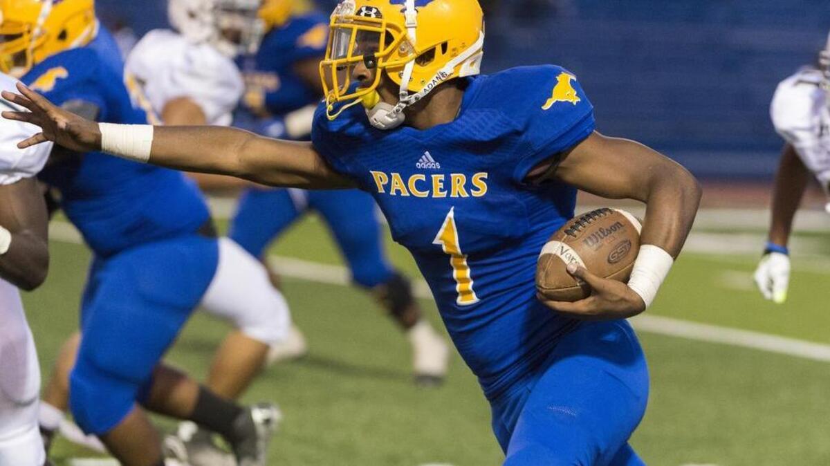 
Grant Pacers Michael Green (1), runs with the ball. 
