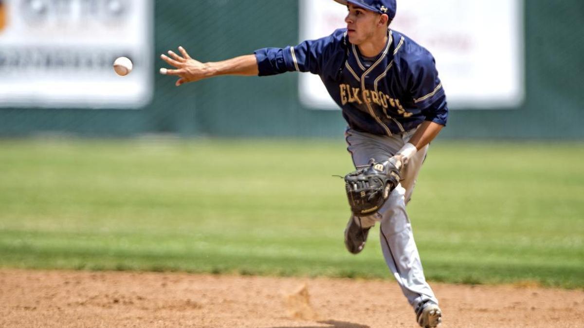 Elk Grove Thundering Herd’s Nick Madrigal (2), tosses the ball to second the first first out of a double play during game two of the best of three in the Sac-Joaquin Section Division I championship baseball game between Elk Grove High School and St. Mary’s High School at Sacramento City College, Saturday May 30, 2015. Elk Grove swept the series in two games, winning the last game 5-2.