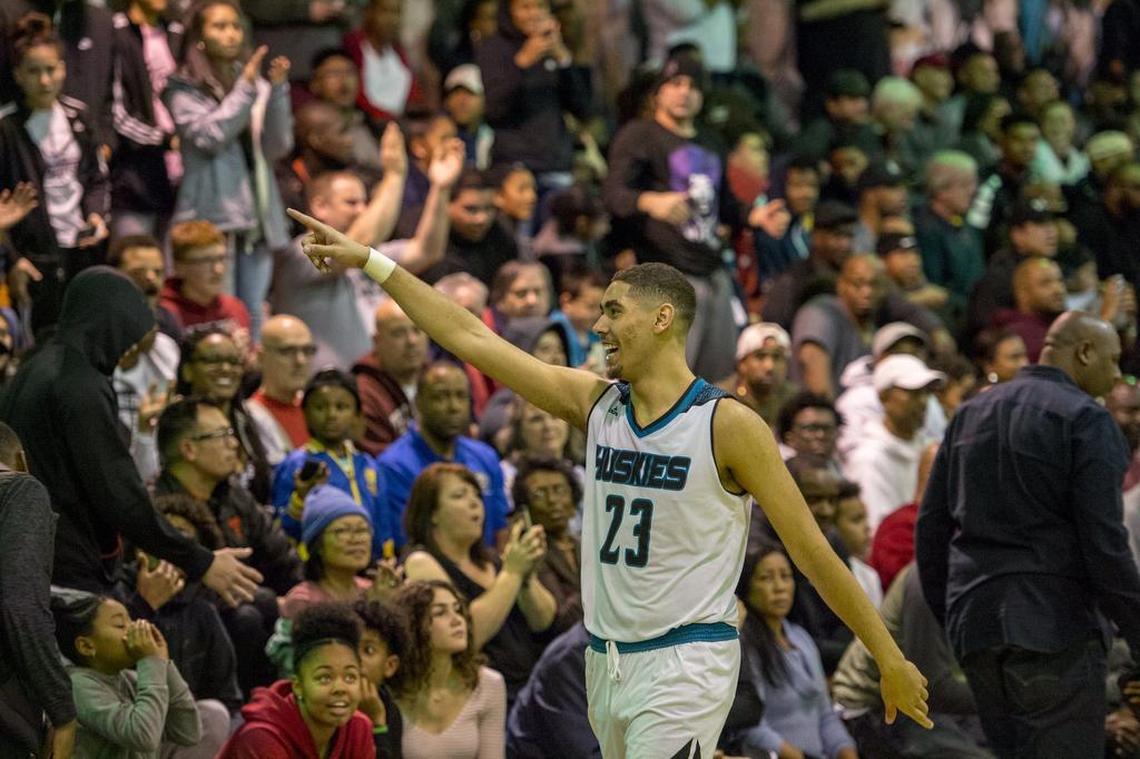 Sheldon Huskies center Chris Wriedt (23) points up into the crowd in the final seconds as Sheldon secures the win.