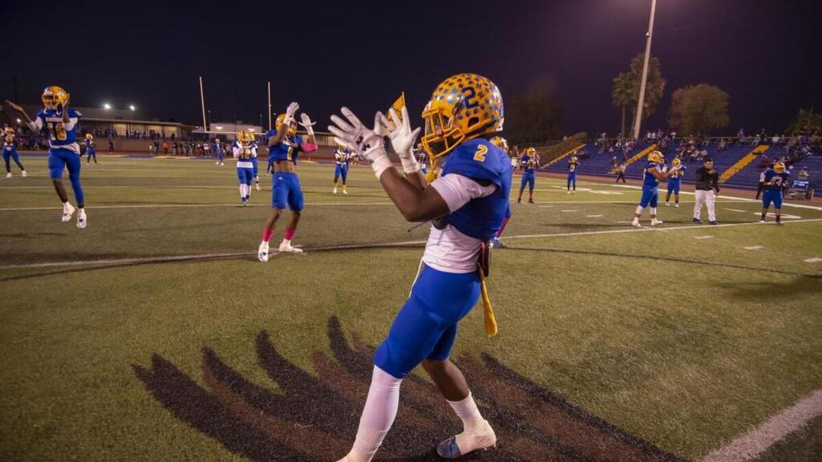 Grant’s Christian Kinsey (2) fires up his team before the game Oct. 19.