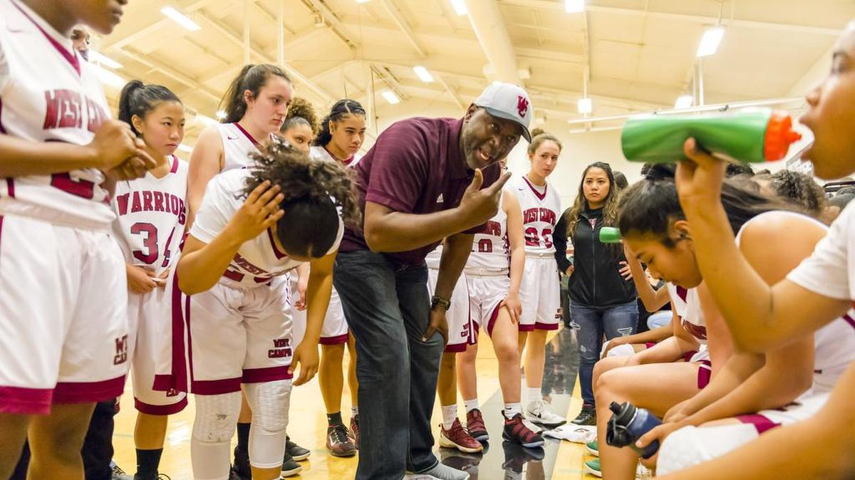 West Campus Warriors coach John Langston talks to his team during a timeout in the fourth quarter of the CIF Northern California Division III  championship game on March 17, 2018.