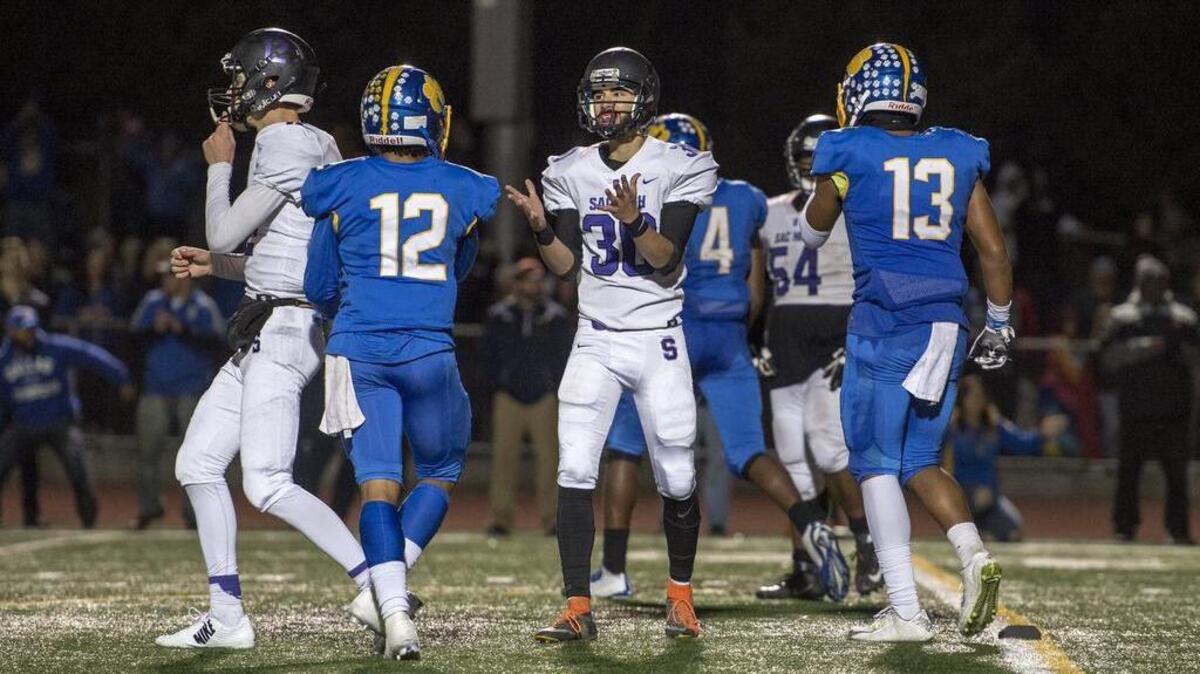 Sacramento High Dragons Xavier Maneewong (33) reacts after missing the extra point field goal attempt as the Dragons went ahead 48-42 in the fourth overtime as Del Campo hosted Sacramento High in the Sac-Joaquin Section football playoff second-round game in Carmichael on November 16, 2017