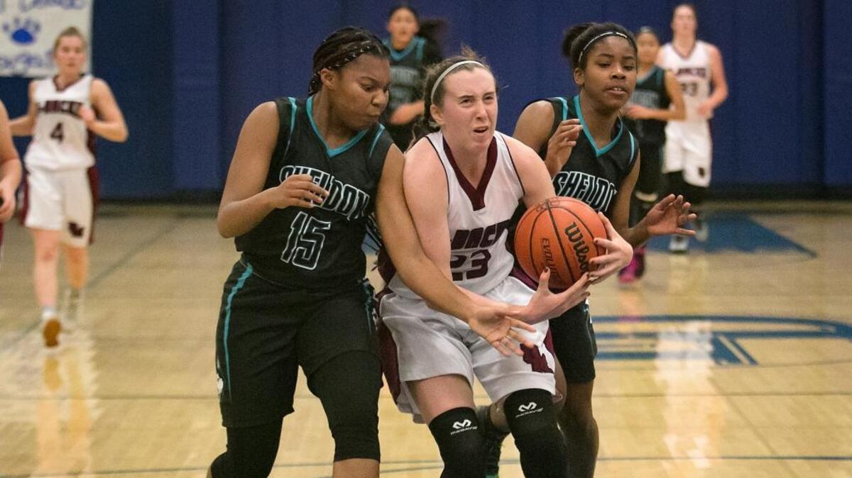 Union Mine’s Ali McDonald, center, goes for a layup against Sheldon’s Melissa Gilmore, left, and Alina Higgins during last month’s Jan Vitel Tournament. McDonald is the top scorer for the 18-1 Diamondbacks.