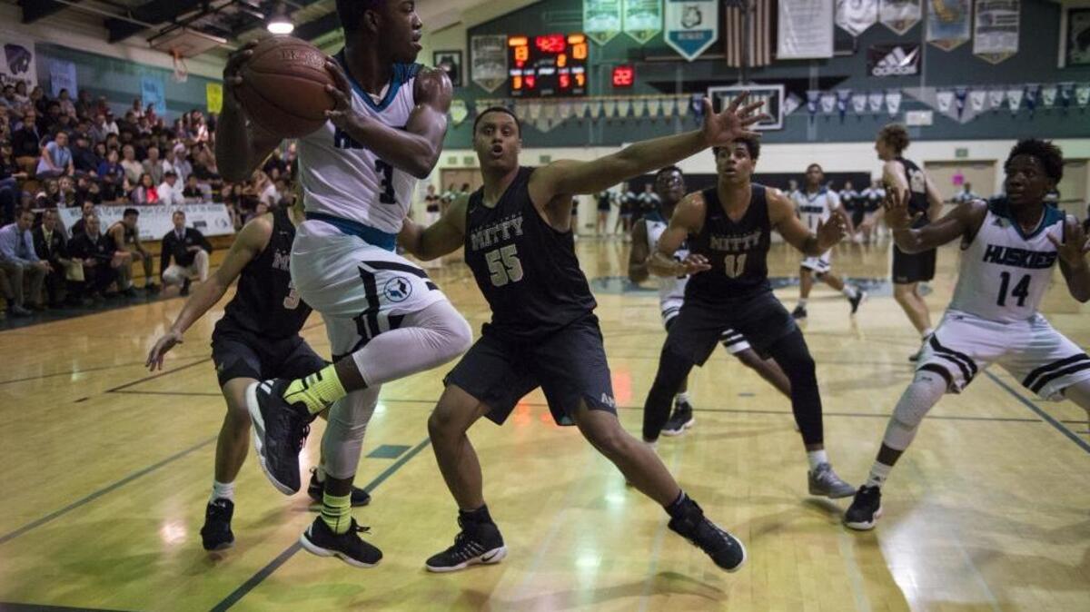 Sheldon Huskies forward Drew Cobb looks for an open man during the second quarter of a CIF NorCal Open Division semifinal game against the Archbishop Mitty Monarchs of San Jose on Tuesday at Sheldon High School in Sacramento. Sheldon won 56-43.