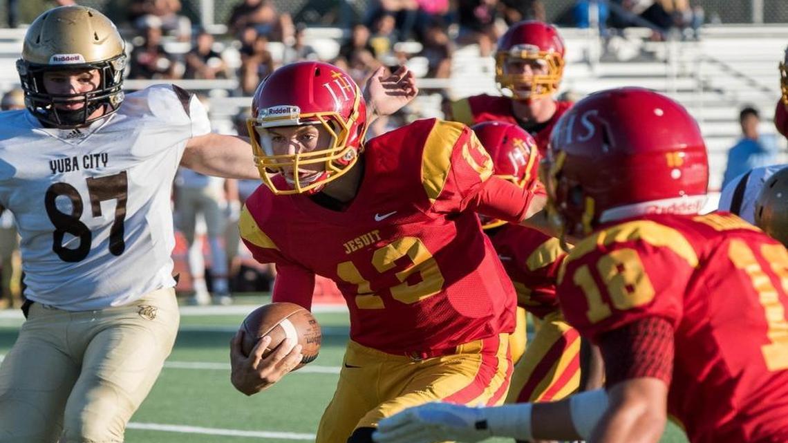 
Jesuit’s Calvin Brownholtz (13) accounted for five touchdowns in his team’s home win over Yuba City on Friday, Sept. 4, 2015.
