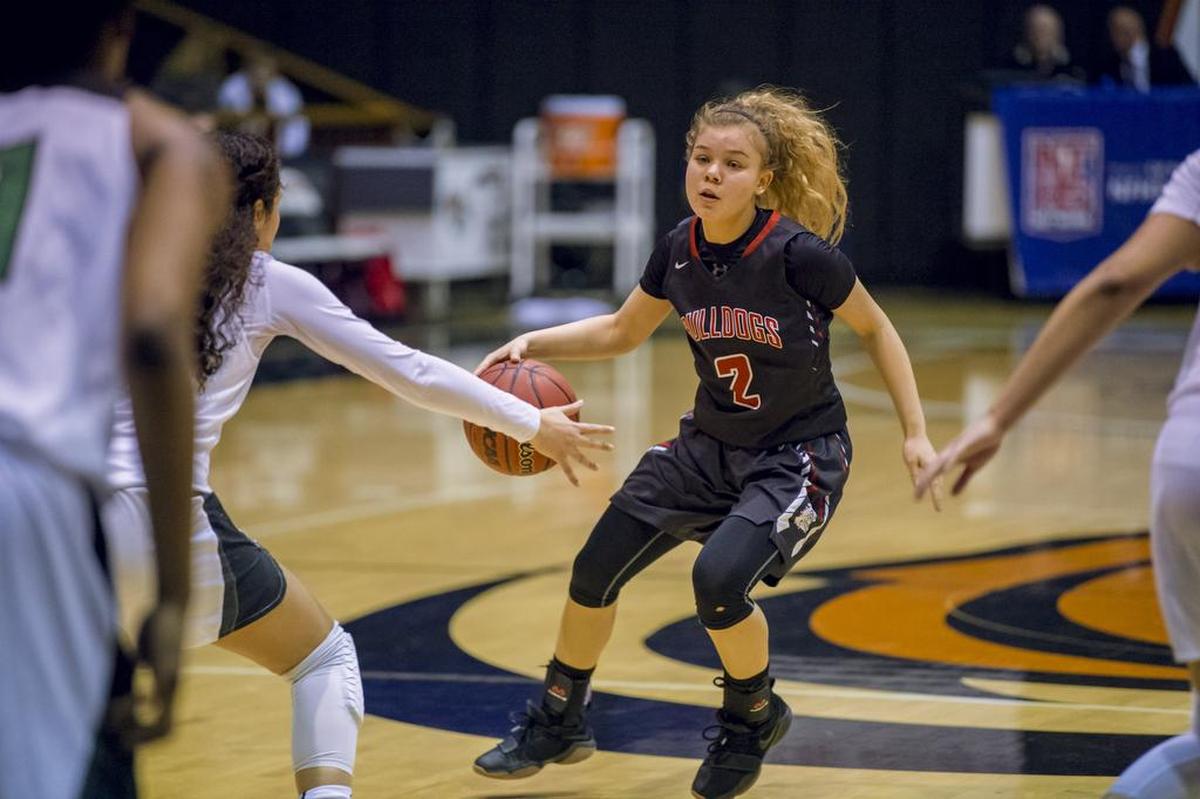 Folsom Bulldogs Charity Gallegos (2) drives to the basket during the second quarter as the Bulldogs fall to the St. Mary's Rams in the CIF Division I Sac-Joaquin Section girls basketball championship game in the Spanos Center at the University of the Pacific, Saturday, March 3, 2018.
