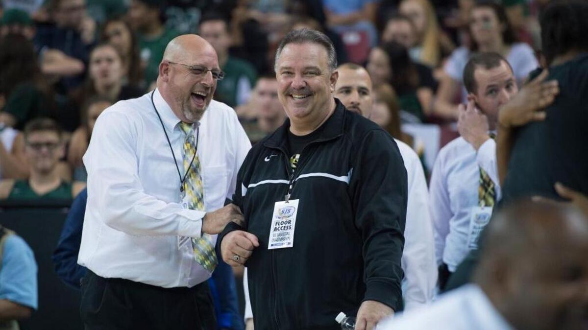 Rio Linda High girls basketball coach Jerry Huffhines, right, hopes he can lead his team back to Sleep Train Arena to play for the Northern California title. ... Huffhines accepts congratulations after his team won the Sac-Joaquin Section Division III championship on Friday, March 4, 2016 at Sleep Train Arena in Sacramento.