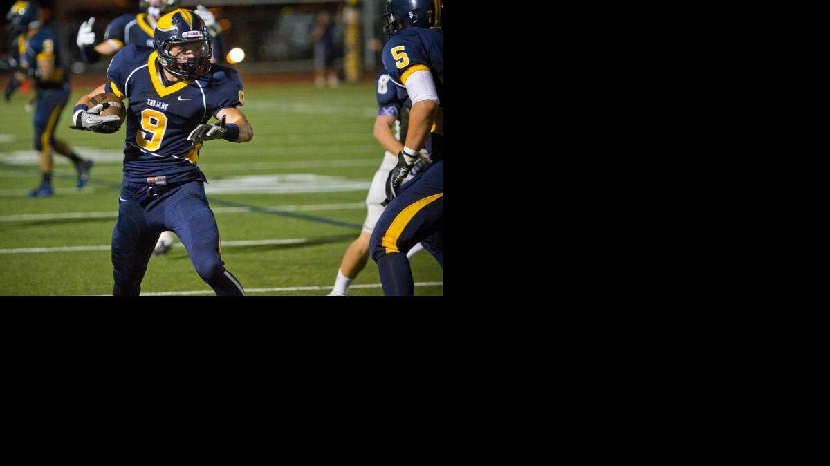 
Dylan Collie, shown in a high school game at Oak Ridge in 2011, hasn’t played since then but looks to catch on with Hawaii.
