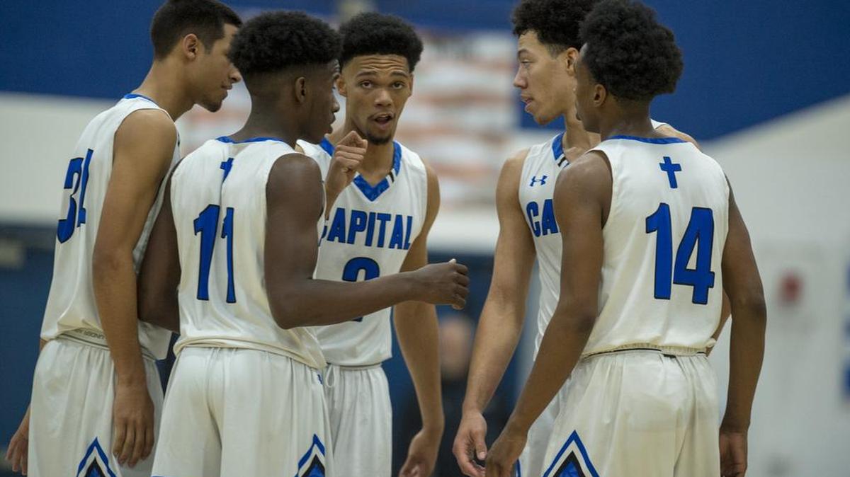 Capital Christian Cougars Zachary Chappell (2) talks to his team on the floor late in the fourth quarter.