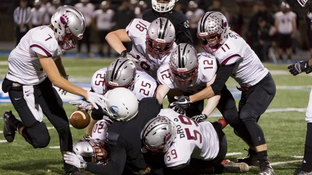 The Bear River Bruins defense tackles Capital Christian’s Maurice Gaines during a Sac-Joaquin Section first-round playoff game on Nov. 9.