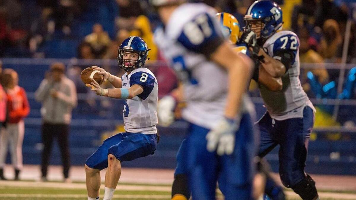John Lagattuta (8 ) has thrown for 1,156 yards and nine touchdowns to help Davis reach the playoffs for only the third time since 1995.
