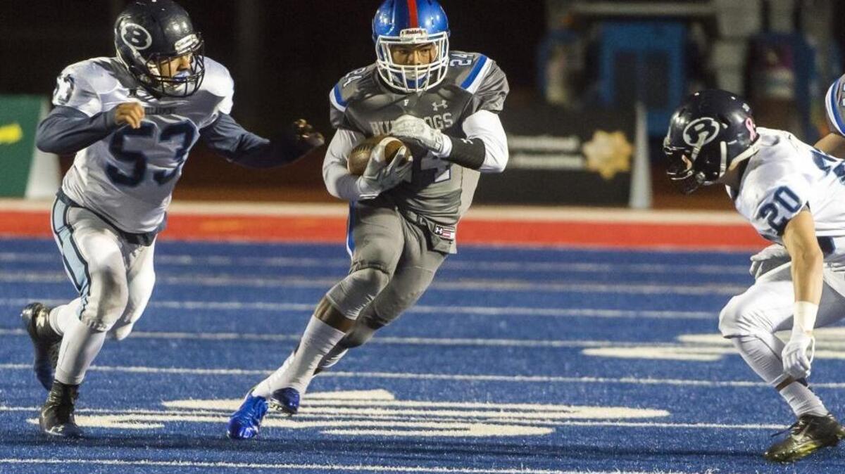 Folsom High School running back Tre Green (24) is expected to sign his letter of intent to attend Cal Poly on National Signing Day. He is one of several Sacramento-area football players heading for a college athletic career.