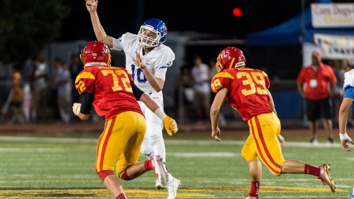 Christian Brothers’ Braeden Bourke (10), passes during the first quarter of the Holy Bowl against the Jesuit Marauders at Hughes Stadium on Sept. 12.