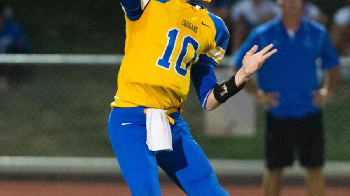 
Del Campo quarterback Ben Purcell, shown here in a game from last season, threw three touchdown passes on Friday, Sept. 25, 2015 in the Cougars’ 64-57 triple overtime win over Roseville.
