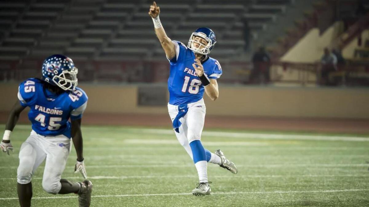 Christian Brothers Falcons Tyler Vander Waal (18), passes the ball during the third quarter of the Sac-Joaquin Section Division I football playoff game between the Christian Brothers Falcons and Cordova Lancers at Hughes Stadium, Friday, Nov. 11, 2016.