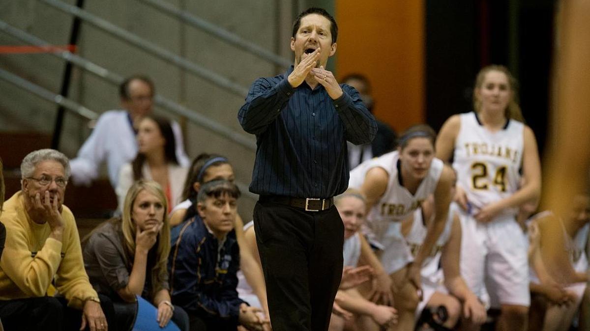 Oak Ridge head coach Steve White calls timeout in a Division I girls basketball semifinal against the Kennedy Cougars in 2013 at the Spanos Center in Stockton.