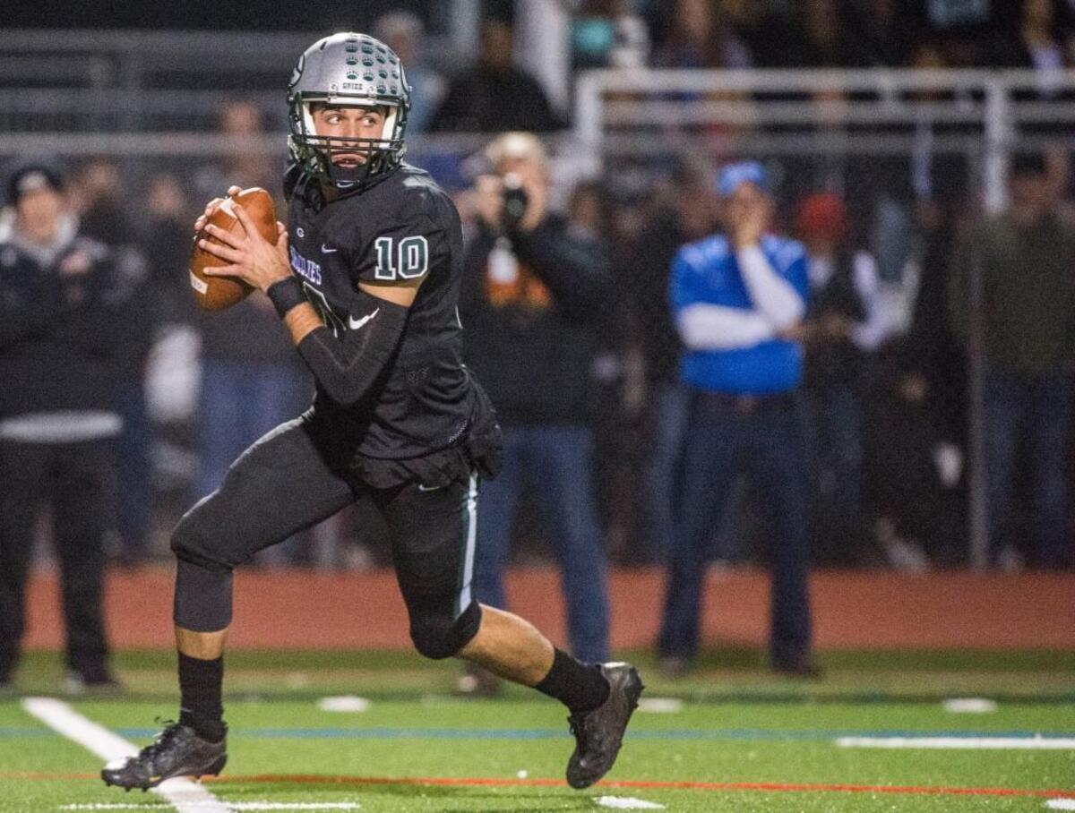 Granite Bay quarterback Jade Foddrill looks to pass against Del Campo on Friday.