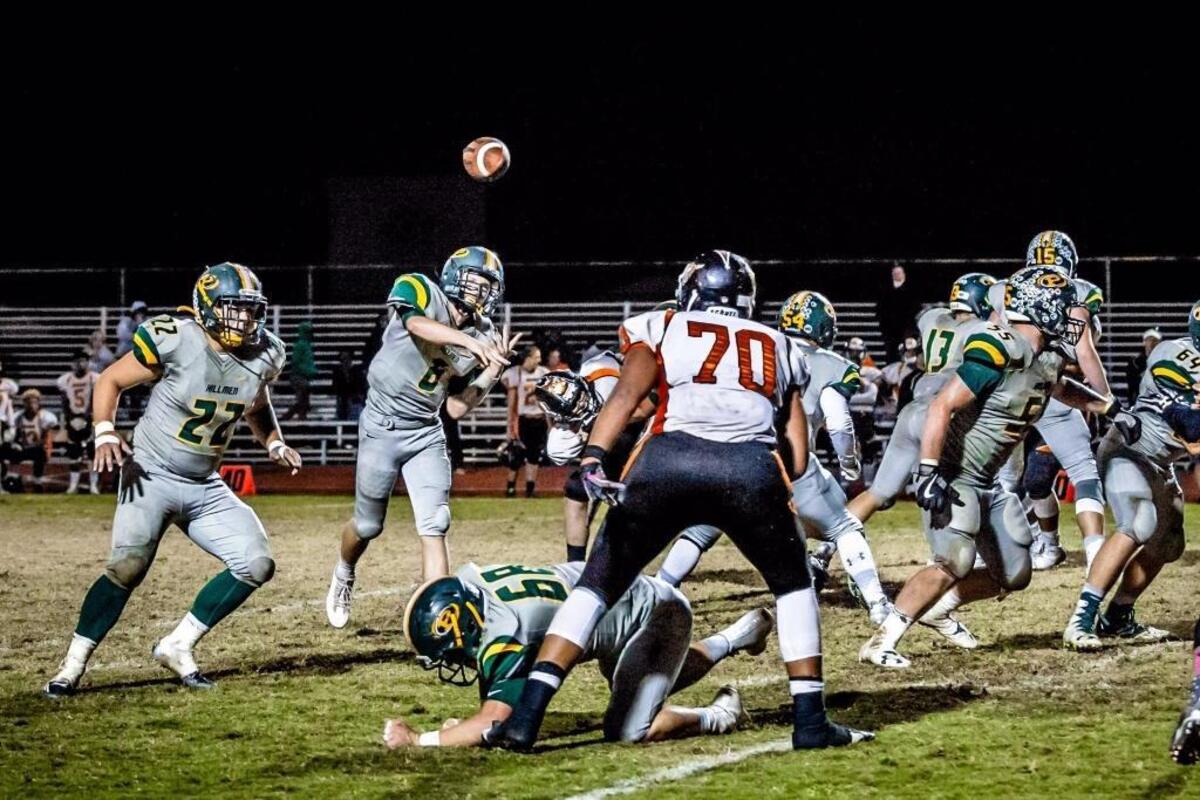 Placer’s Mike Stuck delivers from the pocket. He threw for three touchdown passes against Colfax this season.