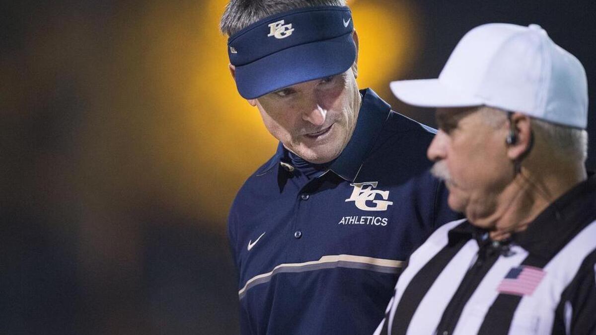 Elk Grove High School football coach Chris Nixon was relieved of his duties